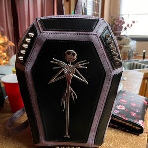 Purple and Black Coffin Backpack with Skeleton Design